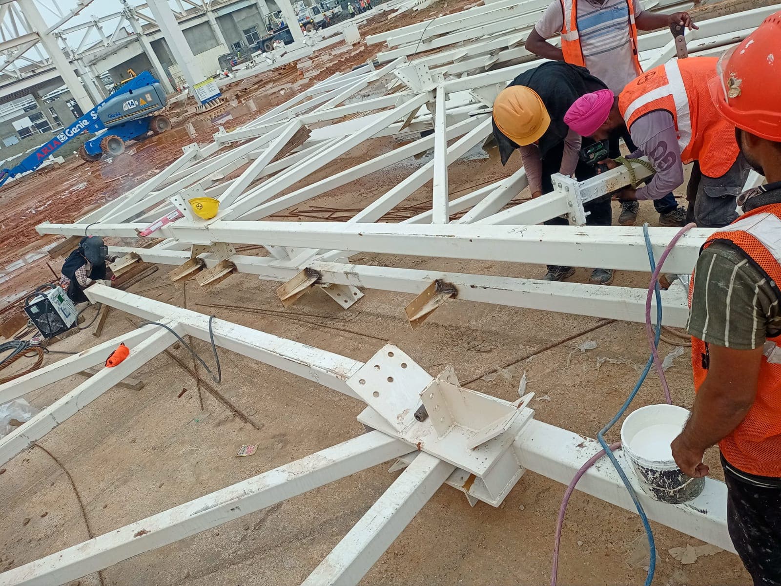SR crew fabricating steel roof trusses at Maruti Suzuki plant